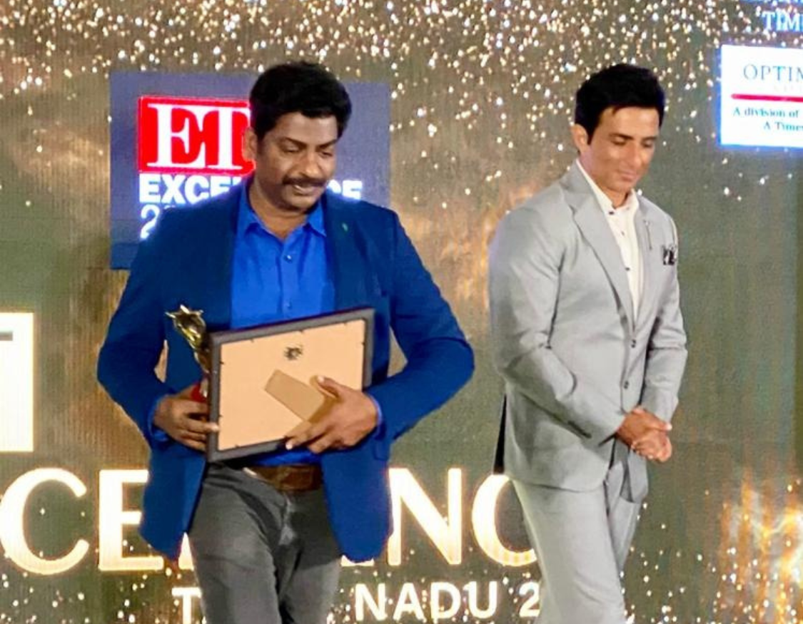 Doctor receiving excellence award